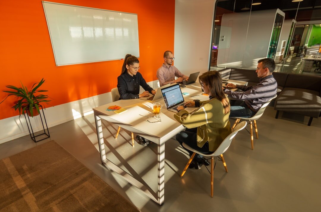 Diverse team of analysts discussing market trends in a meeting room